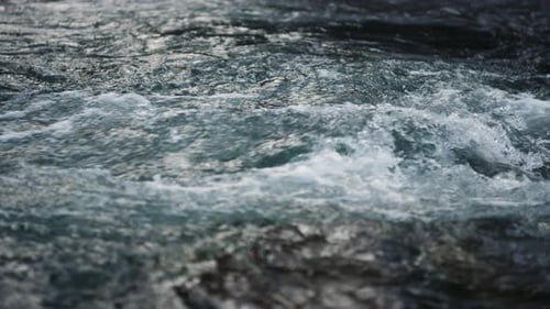 Rapid Stream of Water Flowing in National Park. Waves of Mountain River
