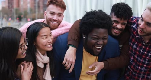 Group of Happy People Having Fun Outdoor Laughing Together