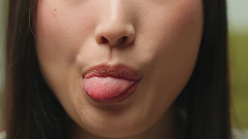 Extreme Close Up Details Face Unrecognizable Asian Woman Mouth Grimacing Stick Out Tongue Girl