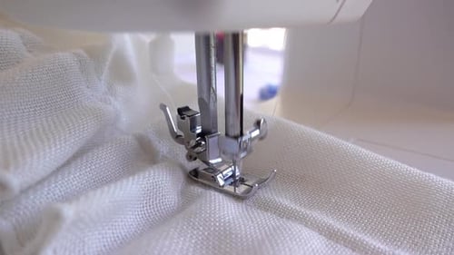 Sewing Machine Stitching White Fabric Close Up