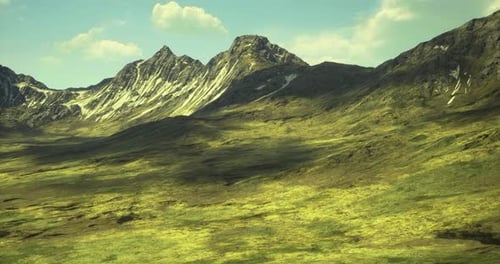 Majestic Mountain Landscape with Lush Greenery Under a Clear Blue Sky