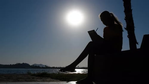 Girl Writer Silhouette By Sea