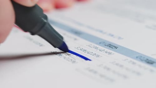 Closeup of Paper Blank Loan Repayment calculationMortgage Payment Sheet Schedule Loan Fee Business