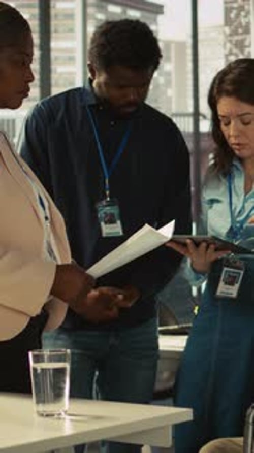 Vertical Video Employee with Paraplegia and Colleagues in Inclusive Office Brainstorming