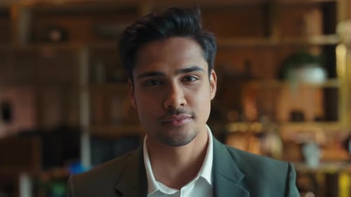 Young Adult Smiling Professional in Office Environment