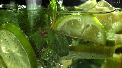 The Mojito Cocktail is Poured Into a Glass Filmed on a Highspeed Camera at 1000 Fps