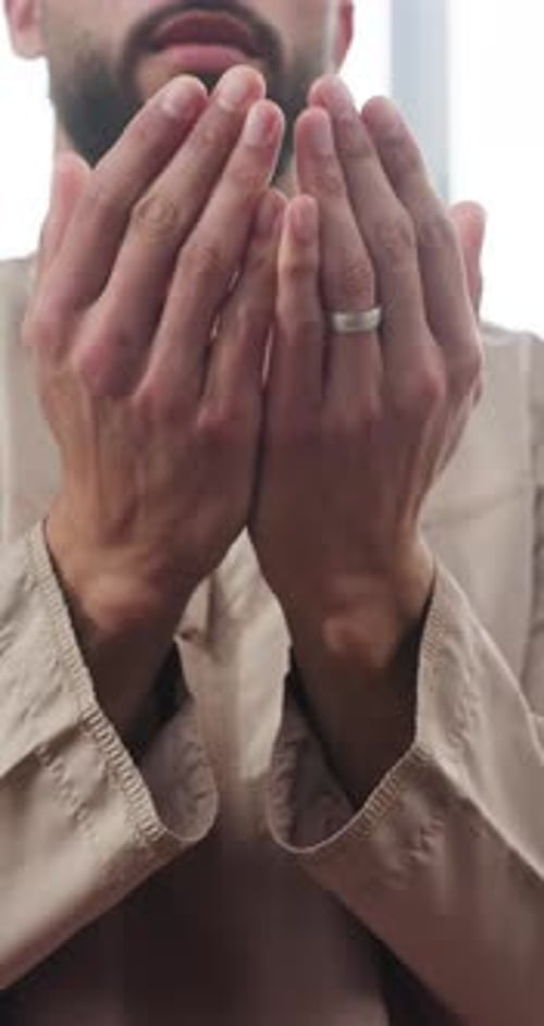Muslim man, hands or praying with dua for worship, faith or spiritual connection with allah in home