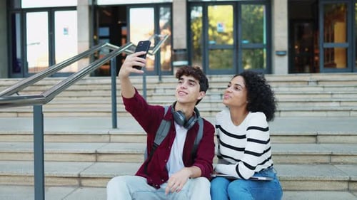 Friends Smiling and Taking a Selfie Outdoors