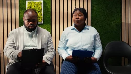 African American Female Candidate Getting Called in the HR Office for Interview