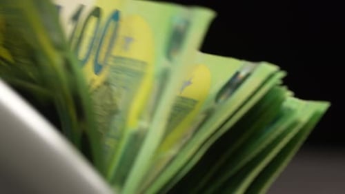 Euro Bills Being Counted by Money Counter Machine