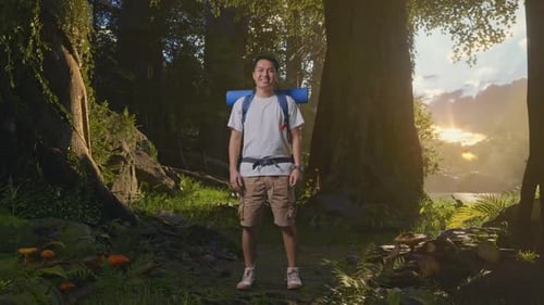Asian Male Smiling To Camera While Exploring Nature