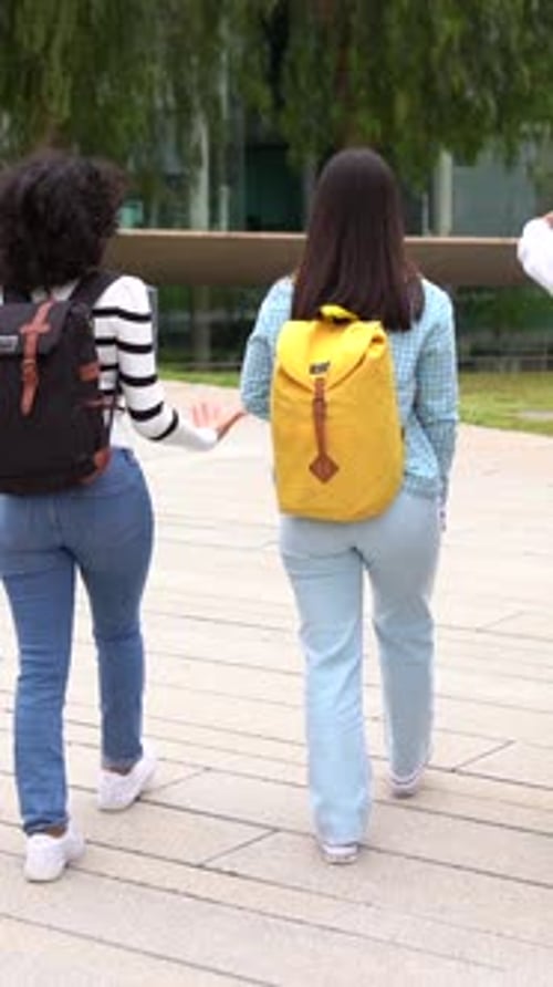 Full Length Video of Students Walking Along the University Campus