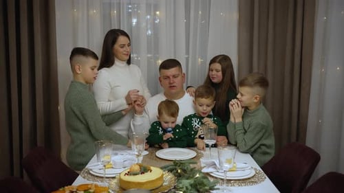 Happy Family Celebrating Christmas Dinner Together