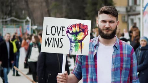 Love Wins Lgbt Rainbow Banner with Fist Gay Man Hold Lgbtq Protest Placard