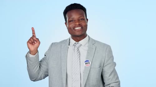 Face, hand pointing and black man in studio with vote, information or promo on blue background