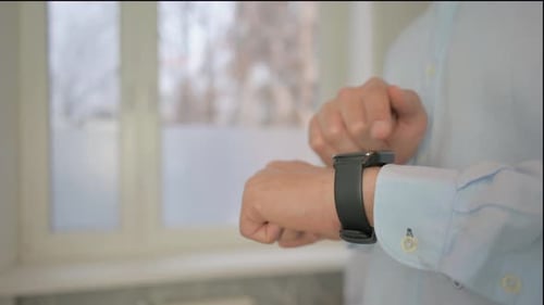 Close up of Man Using Smartwatch