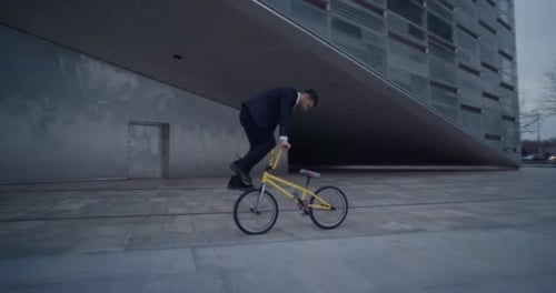 Businessman's Impressive BMX Wheel Walk