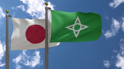 Japan Flag and Green Geometric Star Flag Waving in Sky
