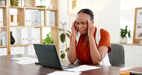 Media agency, headache and black woman in office, fatigue and pressure with deadline for news