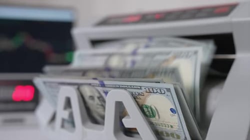 Money Counter Processing Hundred Dollar Bills