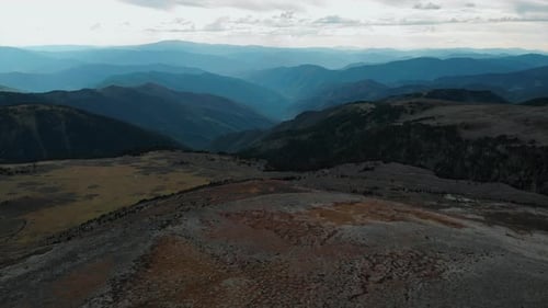 Drone Flying Over a Stunning Mountain Range Valley Media