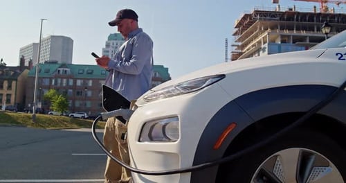 Electric Vehicle Charging Port Plugging in EV Modern Car