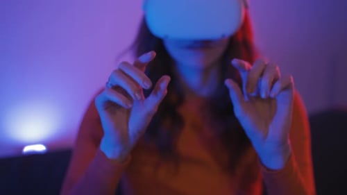 Woman Using VR Headset in Colorful Home Setting
