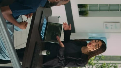 Vertical Video Diverse Coders Talking About Source Code on Terminal Window