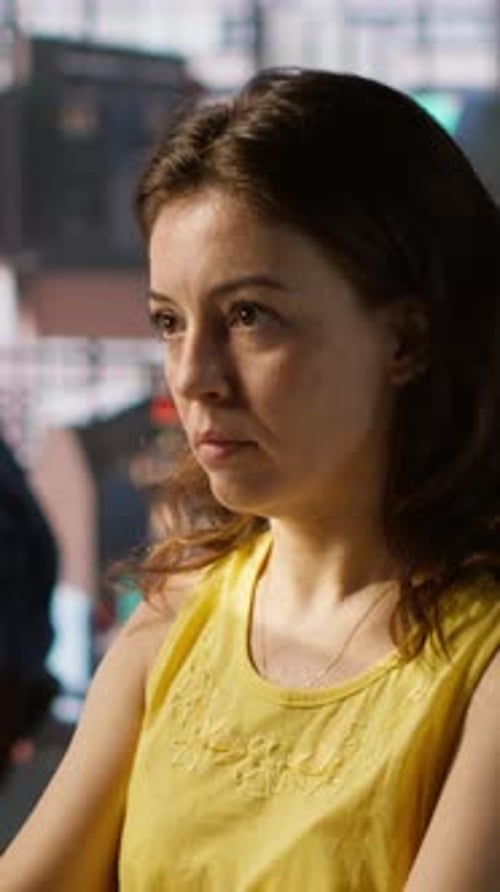 Vertical Video Portrait of Smiling Programmer Creating Machine Learning Models