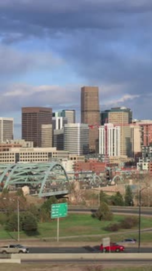 Vertical Video Denver Skyline with Highway Timelapse Pan