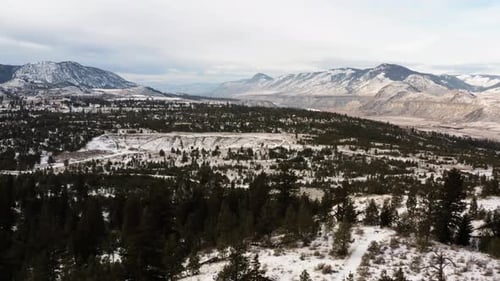 Journey Through Winter Wonder: Barnhartvale Road in Kamloops amidst Snowy and Hilly Terrain