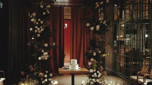 Wedding Cake and Floral Decor Create Romantic Atmosphere