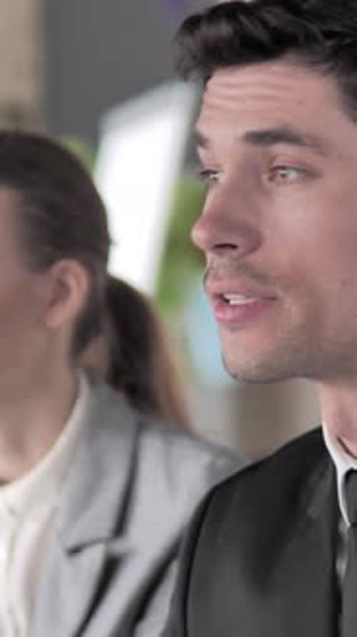 Business People Talking at Corporate Event Indoors