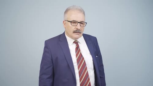 Man in Suit Looking at Camera