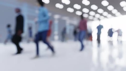 Blurred People Walking in Modern Corporate Space