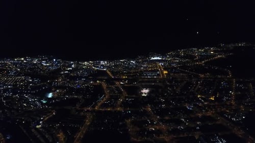 Illuminated Cityscape Aerial at Night