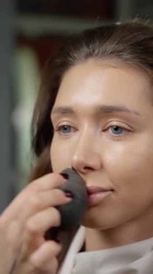 Close Up of Woman Getting Makeup Applied