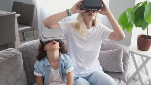 Woman and Child Enjoying VR Experience Together