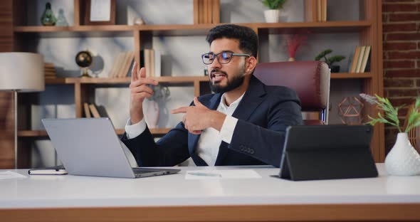 Business man having virtual meeting working on laptop computer giving ...