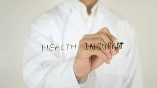 Health Insurance Written by Doctor in White Coat