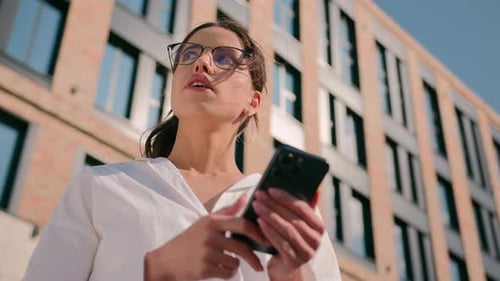 Pensive Thinking Businesswoman Woman Girl Business Lady Using Mobile Phone Outdoors Near Modern