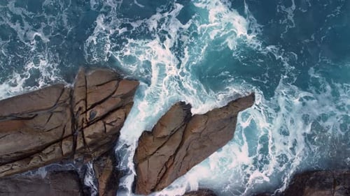 Rocks And Cliff Crashed By Dangerous Waves In Arteixo, La Coruña, Spain. - aerial descend