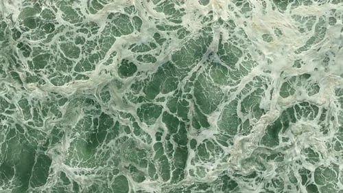 Powerful Sea Waves Crashing On The Foreshore In Stormy Weather. Aerial Drone Shot