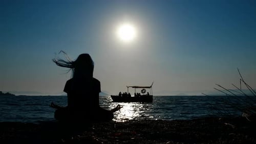 Meditation on the background of the sea landscape.