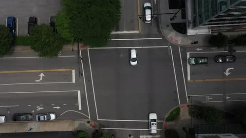 Birds Eye View of Cars Driving at Intersection