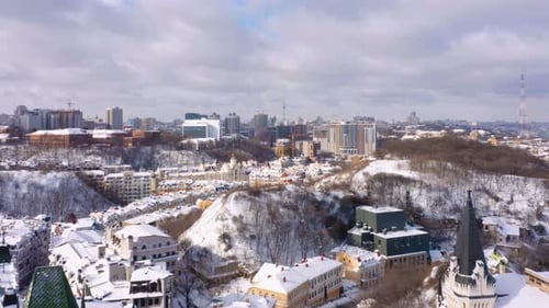 Snow Covered Cityscape Aerial View in Winter