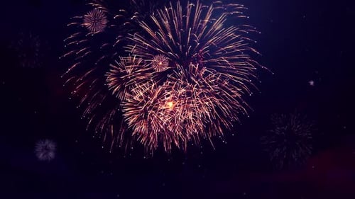 Golden Fireworks Bursting in Night Sky for New Year's Celebrations
