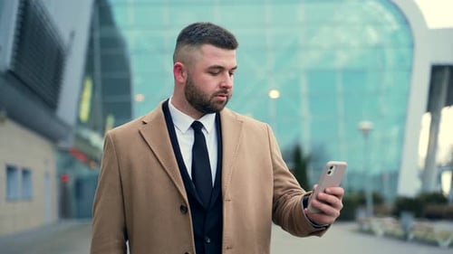 portrait happy business man using mobile phone or smartphone app. close up of handsome tourist man