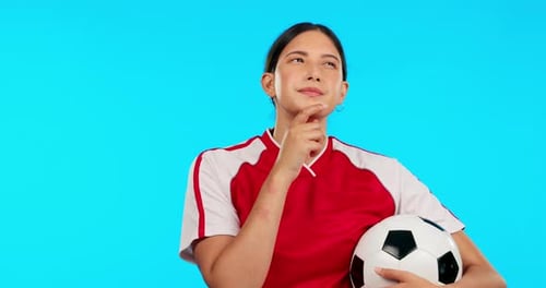 Young woman, football and thinking with ideas, vision and for career, mindset