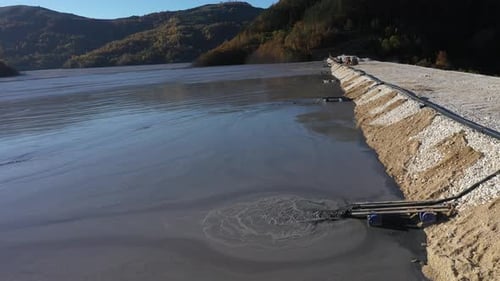 Heavy Metal Contamination From a Copper Mine. Mining Residual Waters Discharging into Decanting Pond